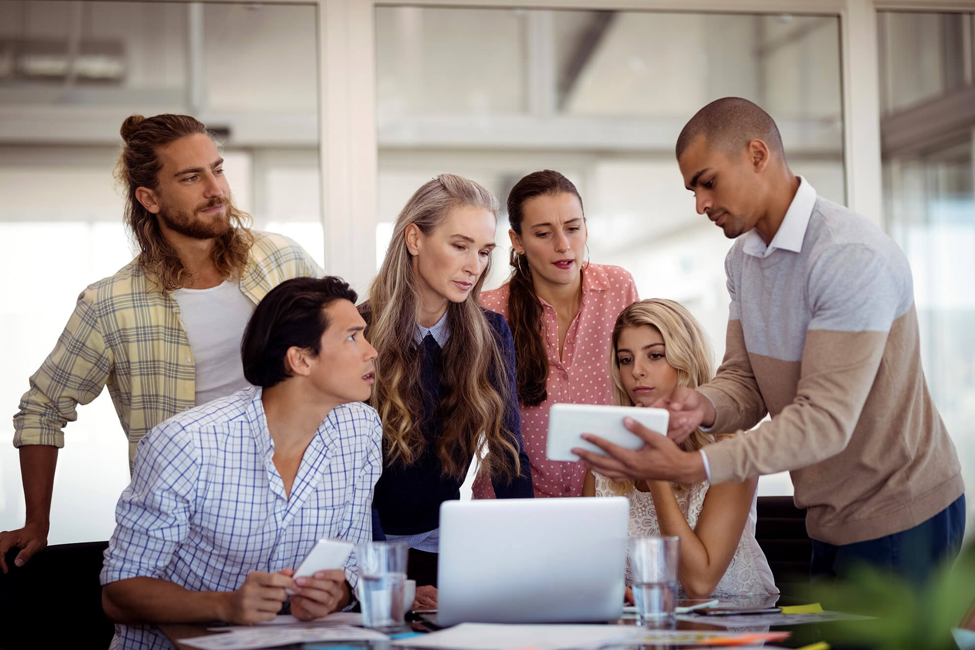 multi ethnic business team sharing active shooter preparedness video at work