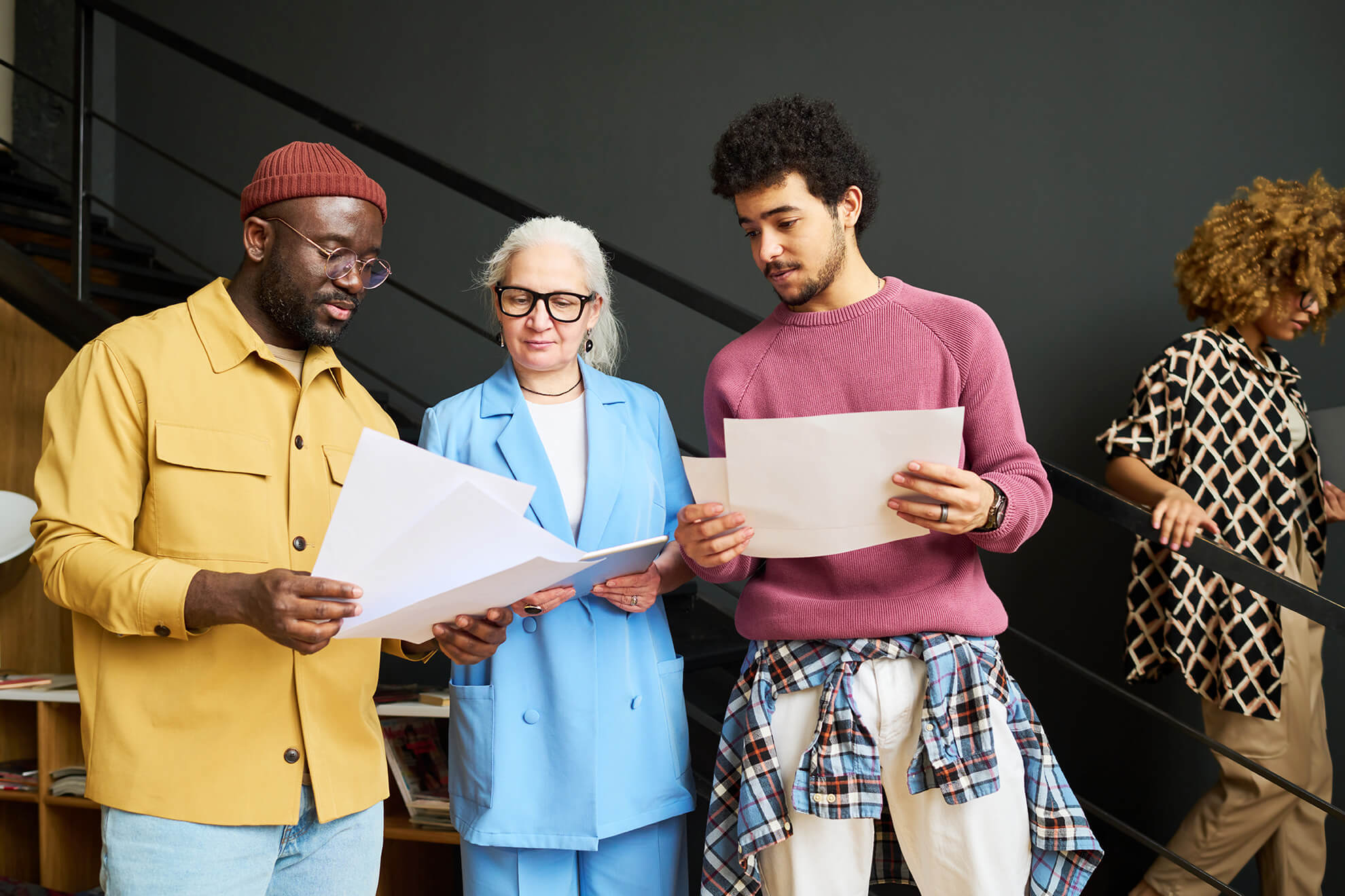 A group of multicultural business colleagues discussing their organization's cultural diversity training initiative